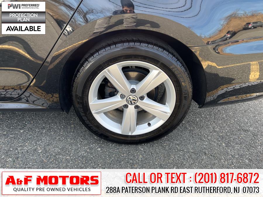 2014 Volkswagen Passat 4dr Sdn 1.8T Auto SE w/Sunroof & Nav, available for sale in East Rutherford, New Jersey | A&F Motors LLC. East Rutherford, New Jersey 2014 Volkswagen Passat 4dr Sdn 1.8T Auto SE w/Sunroof & Nav, available for sale in East Rutherford, New Jersey | A&F Motors LLC. East Rutherford, New Jersey