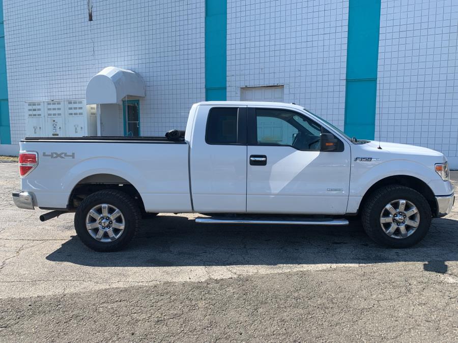 2014 Ford F-150 4WD SuperCab 145" Lariat, available for sale in Milford, Connecticut | Dealertown Auto Wholesalers. Milford, Connecticut