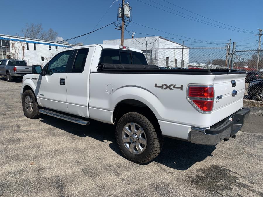 Used Ford F-150 4WD SuperCab 145" Lariat 2014 | Dealertown Auto Wholesalers. Milford, Connecticut Used Ford F-150 4WD SuperCab 145" Lariat 2014 | Dealertown Auto Wholesalers. Milford, Connecticut