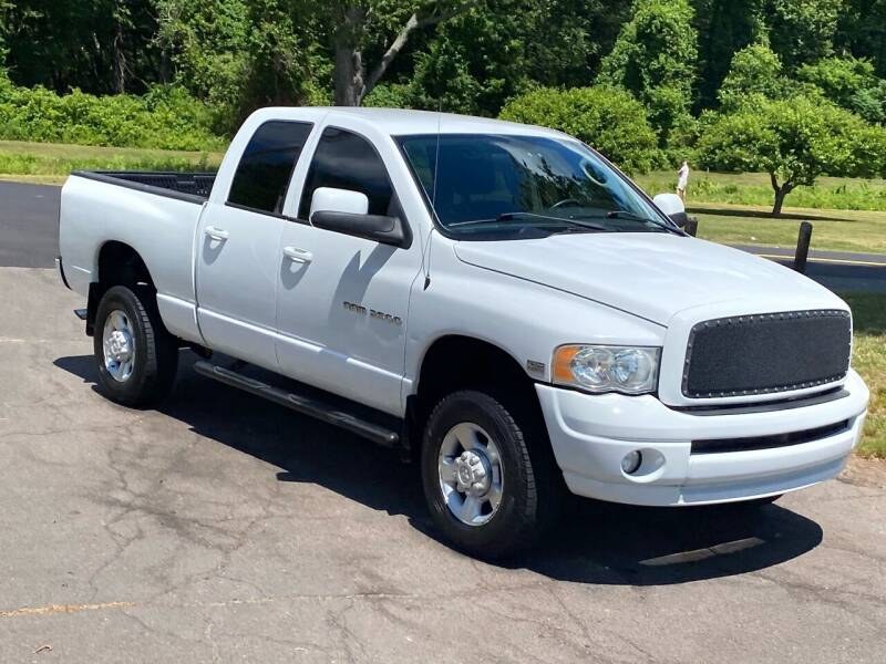 2003 Dodge Ram 2500 4dr Quad Cab 140.5" WB 4WD SLT, available for sale in Plainville, Connecticut | Choice Group LLC Choice Motor Car. Plainville, Connecticut