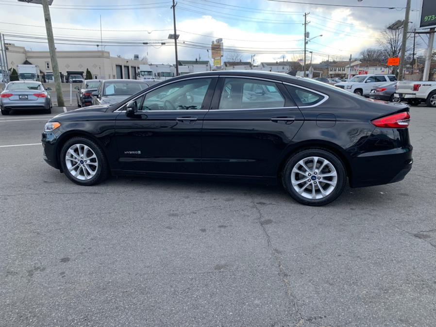 2019 Ford Fusion Hybrid SEL FWD, available for sale in Lodi, New Jersey | European Auto Expo. Lodi, New Jersey 2019 Ford Fusion Hybrid SEL FWD, available for sale in Lodi, New Jersey | European Auto Expo. Lodi, New Jersey