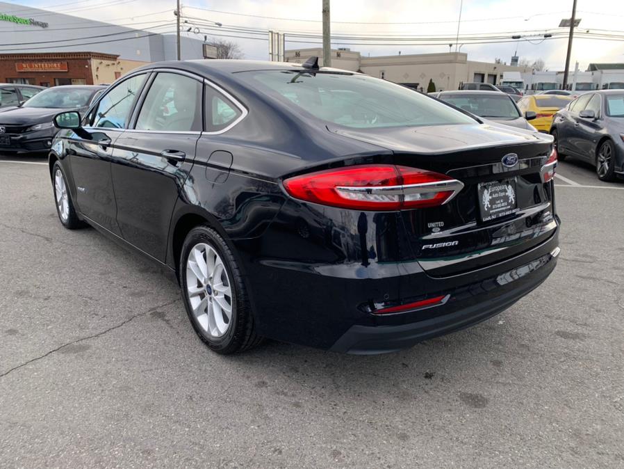 2019 Ford Fusion Hybrid SEL FWD, available for sale in Lodi, New Jersey | European Auto Expo. Lodi, New Jersey 2019 Ford Fusion Hybrid SEL FWD, available for sale in Lodi, New Jersey | European Auto Expo. Lodi, New Jersey