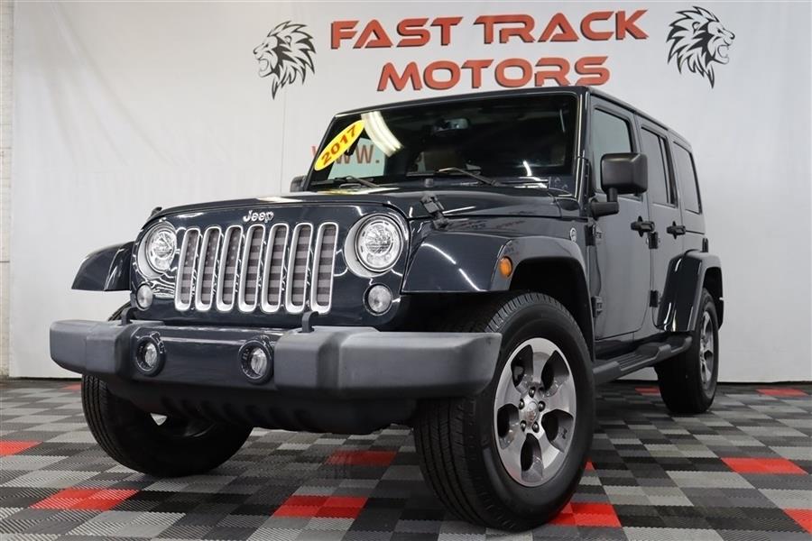 2017 Jeep Wrangler Unlimited SAHARA, available for sale in Paterson, New Jersey | Fast Track Motors. Paterson, New Jersey