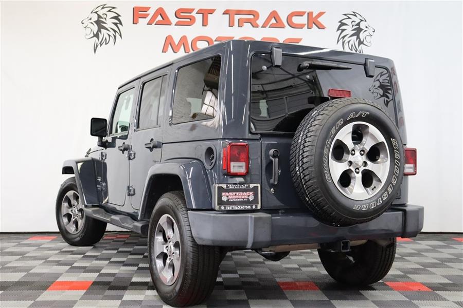 2017 Jeep Wrangler Unlimited SAHARA, available for sale in Paterson, New Jersey | Fast Track Motors. Paterson, New Jersey 2017 Jeep Wrangler Unlimited SAHARA, available for sale in Paterson, New Jersey | Fast Track Motors. Paterson, New Jersey