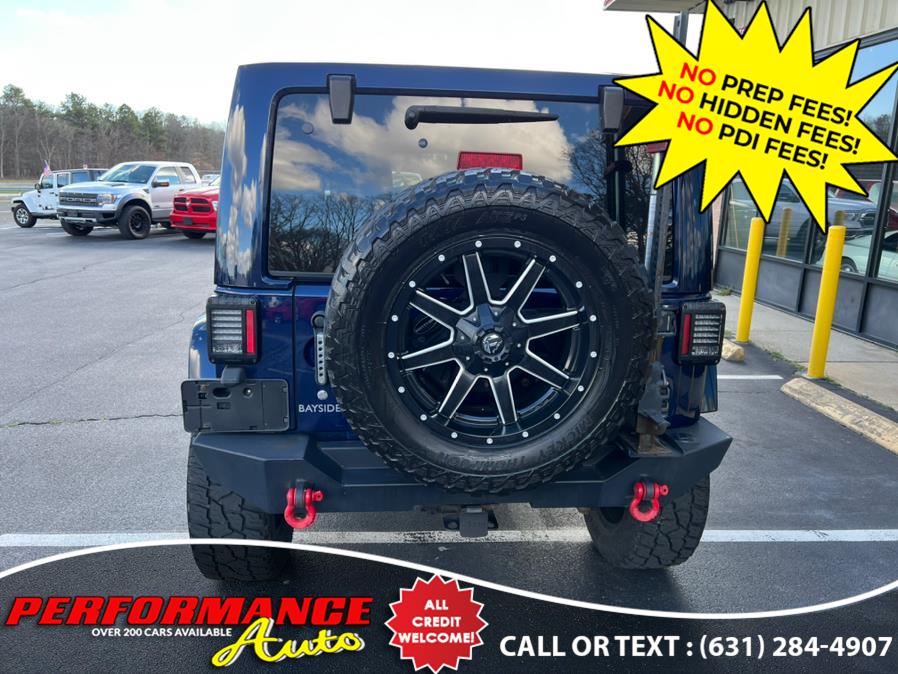 Used Jeep Wrangler Unlimited 4WD 4dr Rubicon 10th Anniversary 2013 | Performance Auto Inc. Bohemia, New York Used Jeep Wrangler Unlimited 4WD 4dr Rubicon 10th Anniversary 2013 | Performance Auto Inc. Bohemia, New York