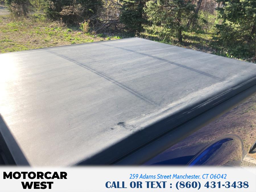 Used Nissan Frontier 4WD King Cab Auto SV 2014 | Motorcar West. Manchester, Connecticut Used Nissan Frontier 4WD King Cab Auto SV 2014 | Motorcar West. Manchester, Connecticut