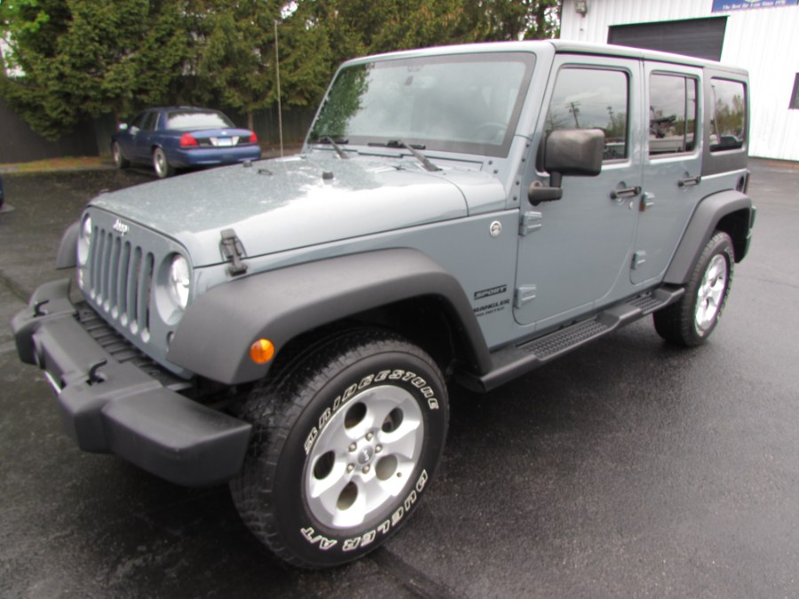 2014 Jeep Wrangler Unlimited 4WD 4dr Willys Wheeler, available for sale in Milford, Connecticut | Chip's Auto Sales Inc. Milford, Connecticut