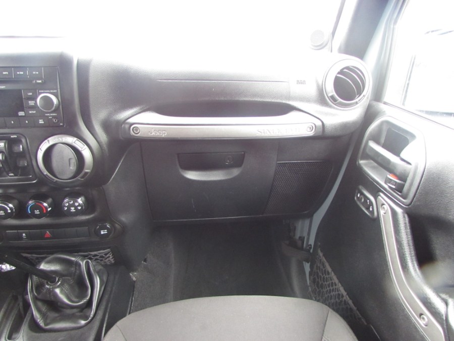 2014 Jeep Wrangler Unlimited 4WD 4dr Willys Wheeler, available for sale in Milford, Connecticut | Chip's Auto Sales Inc. Milford, Connecticut 2014 Jeep Wrangler Unlimited 4WD 4dr Willys Wheeler, available for sale in Milford, Connecticut | Chip's Auto Sales Inc. Milford, Connecticut