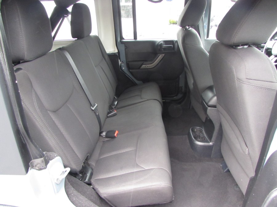 2014 Jeep Wrangler Unlimited 4WD 4dr Willys Wheeler, available for sale in Milford, Connecticut | Chip's Auto Sales Inc. Milford, Connecticut 2014 Jeep Wrangler Unlimited 4WD 4dr Willys Wheeler, available for sale in Milford, Connecticut | Chip's Auto Sales Inc. Milford, Connecticut