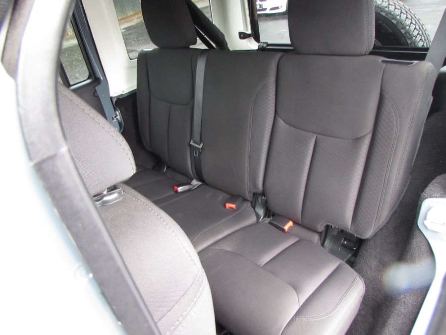 2014 Jeep Wrangler Unlimited 4WD 4dr Willys Wheeler, available for sale in Milford, Connecticut | Chip's Auto Sales Inc. Milford, Connecticut 2014 Jeep Wrangler Unlimited 4WD 4dr Willys Wheeler, available for sale in Milford, Connecticut | Chip's Auto Sales Inc. Milford, Connecticut