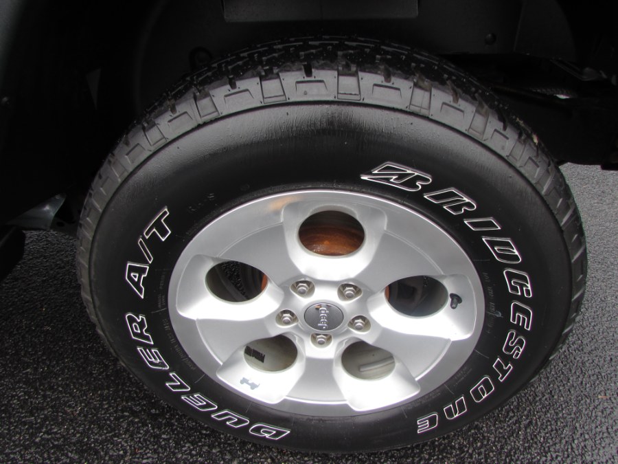 2014 Jeep Wrangler Unlimited 4WD 4dr Willys Wheeler, available for sale in Milford, Connecticut | Chip's Auto Sales Inc. Milford, Connecticut 2014 Jeep Wrangler Unlimited 4WD 4dr Willys Wheeler, available for sale in Milford, Connecticut | Chip's Auto Sales Inc. Milford, Connecticut