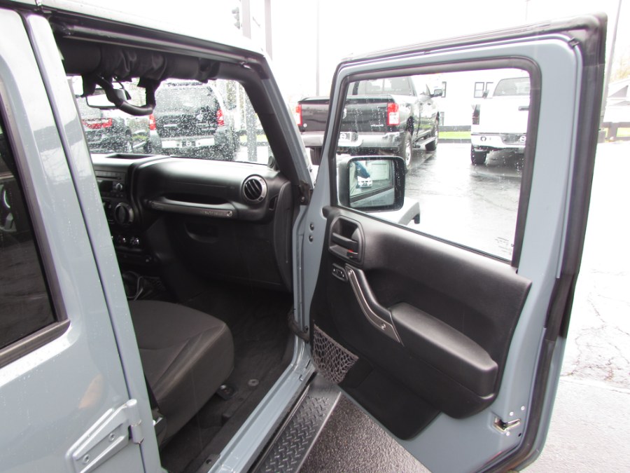 2014 Jeep Wrangler Unlimited 4WD 4dr Willys Wheeler, available for sale in Milford, Connecticut | Chip's Auto Sales Inc. Milford, Connecticut 2014 Jeep Wrangler Unlimited 4WD 4dr Willys Wheeler, available for sale in Milford, Connecticut | Chip's Auto Sales Inc. Milford, Connecticut