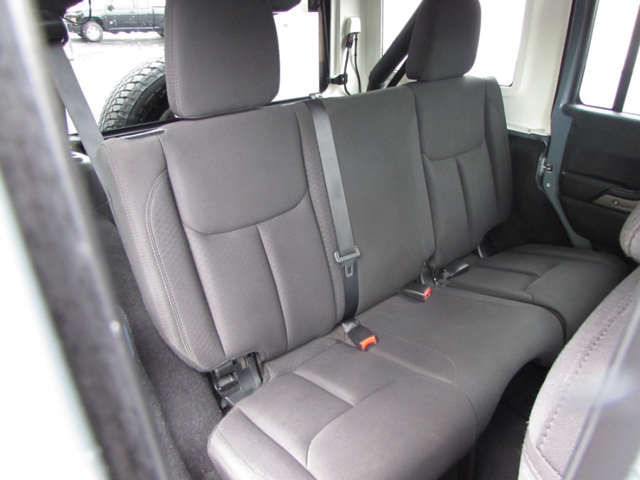 2014 Jeep Wrangler Unlimited 4WD 4dr Willys Wheeler, available for sale in Milford, Connecticut | Chip's Auto Sales Inc. Milford, Connecticut 2014 Jeep Wrangler Unlimited 4WD 4dr Willys Wheeler, available for sale in Milford, Connecticut | Chip's Auto Sales Inc. Milford, Connecticut