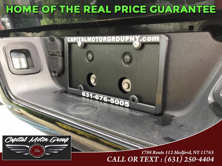 Used Ram 1500 4WD Crew Cab 140.5" Sport 2014 | Capital Motor Group Inc. Medford, New York Used Ram 1500 4WD Crew Cab 140.5" Sport 2014 | Capital Motor Group Inc. Medford, New York