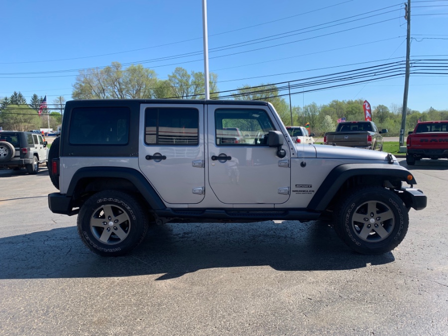 Used Jeep Wrangler Unlimited 4WD 4dr Freedom Edition *Ltd Avail* 2013 | Marsh Auto Sales LLC. Ortonville, Michigan Used Jeep Wrangler Unlimited 4WD 4dr Freedom Edition *Ltd Avail* 2013 | Marsh Auto Sales LLC. Ortonville, Michigan