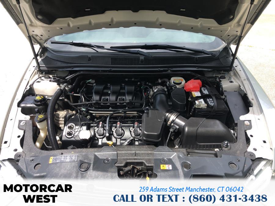 2013 Ford Taurus 4dr Sdn Limited AWD, available for sale in Manchester, Connecticut | Motorcar West. Manchester, Connecticut 2013 Ford Taurus 4dr Sdn Limited AWD, available for sale in Manchester, Connecticut | Motorcar West. Manchester, Connecticut