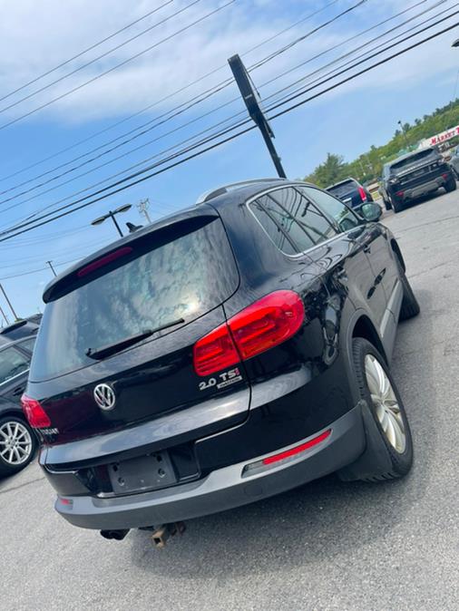 2014 Volkswagen Tiguan 4MOTION 4dr Auto SEL, available for sale in Raynham, Massachusetts | J & A Auto Center. Raynham, Massachusetts 2014 Volkswagen Tiguan 4MOTION 4dr Auto SEL, available for sale in Raynham, Massachusetts | J & A Auto Center. Raynham, Massachusetts