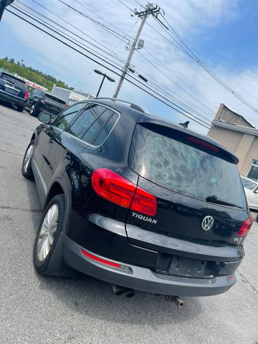 2014 Volkswagen Tiguan 4MOTION 4dr Auto SEL, available for sale in Raynham, Massachusetts | J & A Auto Center. Raynham, Massachusetts 2014 Volkswagen Tiguan 4MOTION 4dr Auto SEL, available for sale in Raynham, Massachusetts | J & A Auto Center. Raynham, Massachusetts