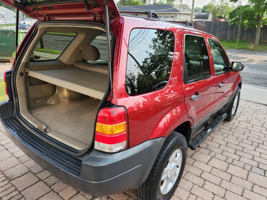 Used Ford Escape 4dr 103" WB XLT 4WD 2004 | SGM Auto Sales. West Babylon, New York Used Ford Escape 4dr 103" WB XLT 4WD 2004 | SGM Auto Sales. West Babylon, New York