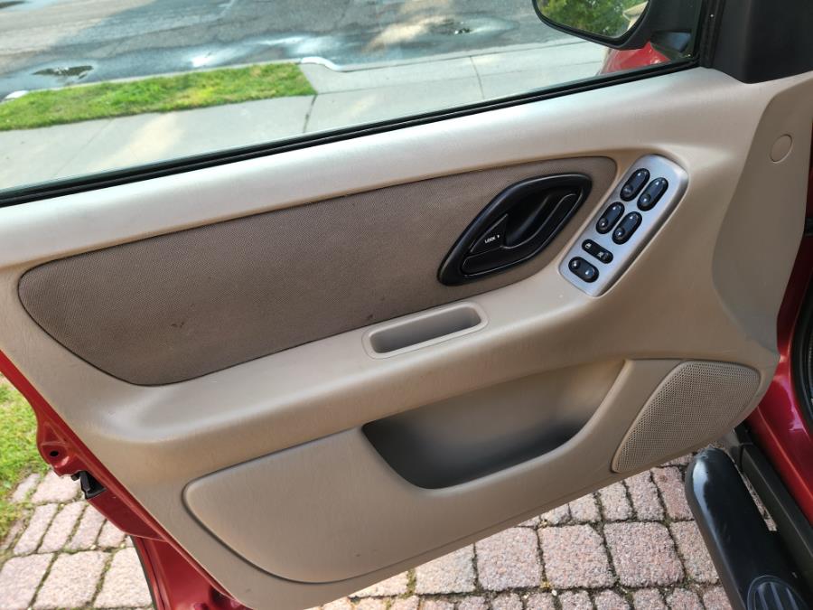 Used Ford Escape 4dr 103" WB XLT 4WD 2004 | SGM Auto Sales. West Babylon, New York Used Ford Escape 4dr 103" WB XLT 4WD 2004 | SGM Auto Sales. West Babylon, New York