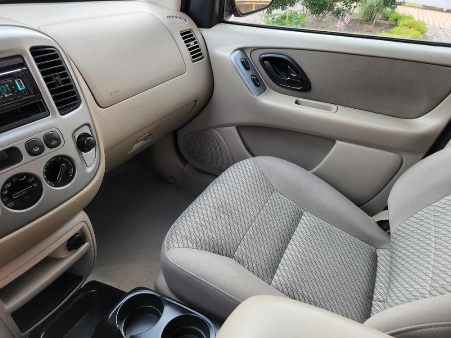 Used Ford Escape 4dr 103" WB XLT 4WD 2004 | SGM Auto Sales. West Babylon, New York Used Ford Escape 4dr 103" WB XLT 4WD 2004 | SGM Auto Sales. West Babylon, New York