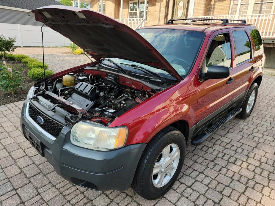 Used Ford Escape 4dr 103" WB XLT 4WD 2004 | SGM Auto Sales. West Babylon, New York Used Ford Escape 4dr 103" WB XLT 4WD 2004 | SGM Auto Sales. West Babylon, New York