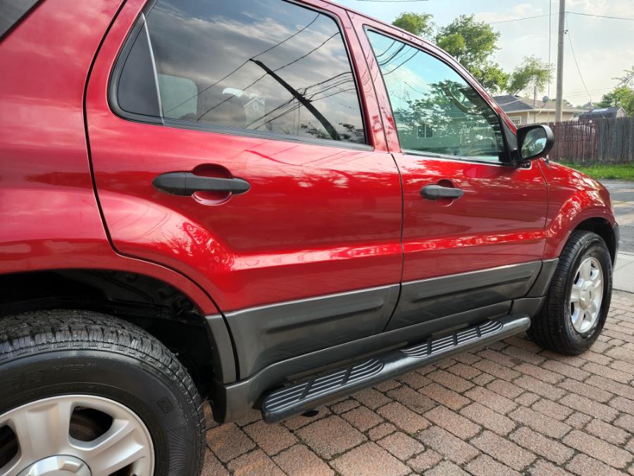 Used Ford Escape 4dr 103" WB XLT 4WD 2004 | SGM Auto Sales. West Babylon, New York Used Ford Escape 4dr 103" WB XLT 4WD 2004 | SGM Auto Sales. West Babylon, New York