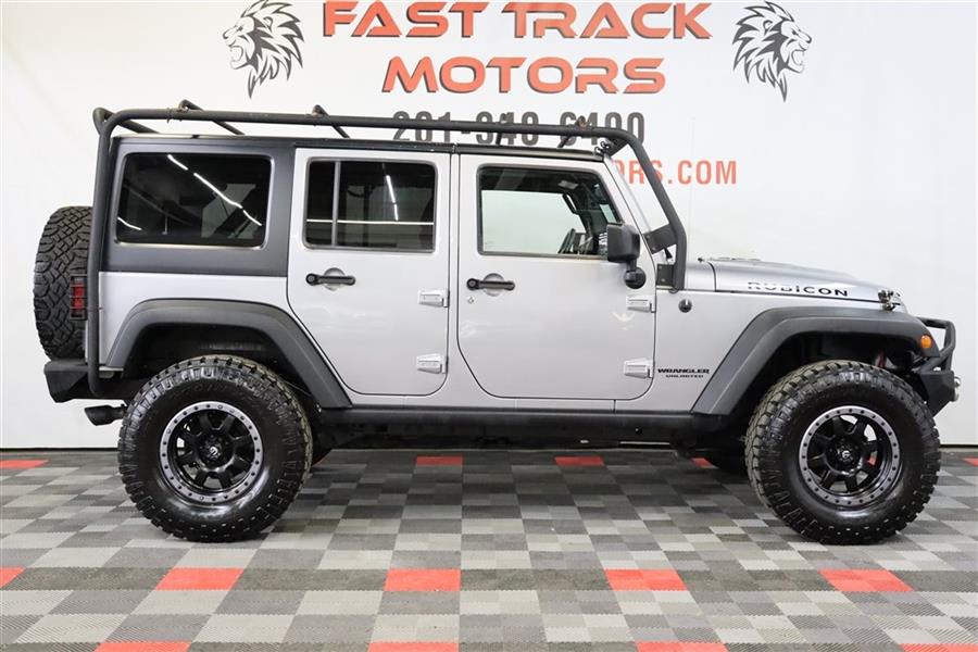 2014 Jeep Wrangler Unlimited RUBICON, available for sale in Paterson, New Jersey | Fast Track Motors. Paterson, New Jersey 2014 Jeep Wrangler Unlimited RUBICON, available for sale in Paterson, New Jersey | Fast Track Motors. Paterson, New Jersey