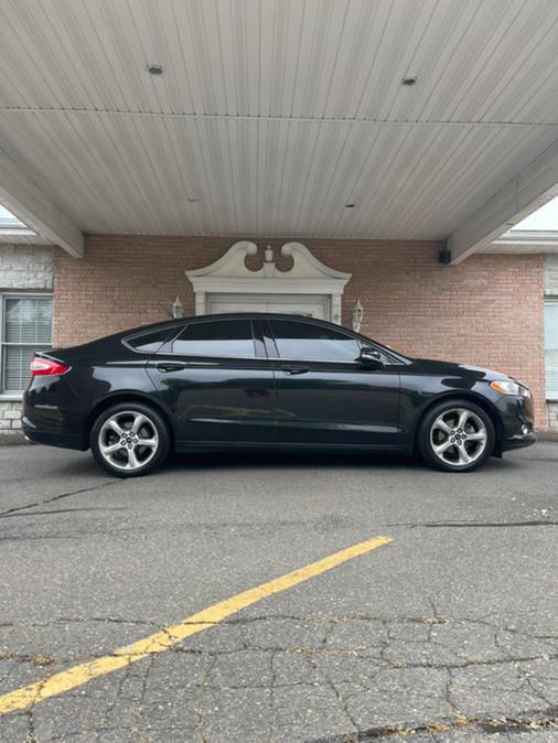 2015 Ford Fusion 4dr Sdn SE FWD, available for sale in New Britain, Connecticut | Supreme Automotive. New Britain, Connecticut 2015 Ford Fusion 4dr Sdn SE FWD, available for sale in New Britain, Connecticut | Supreme Automotive. New Britain, Connecticut