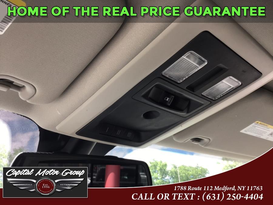 Used Ram 1500 4WD Crew Cab 140.5" Big Horn 2015 | Capital Motor Group Inc. Medford, New York Used Ram 1500 4WD Crew Cab 140.5" Big Horn 2015 | Capital Motor Group Inc. Medford, New York