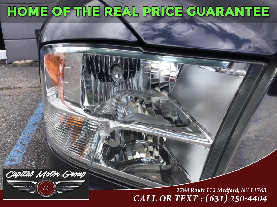 Used Ram 1500 4WD Crew Cab 140.5" Big Horn 2015 | Capital Motor Group Inc. Medford, New York Used Ram 1500 4WD Crew Cab 140.5" Big Horn 2015 | Capital Motor Group Inc. Medford, New York