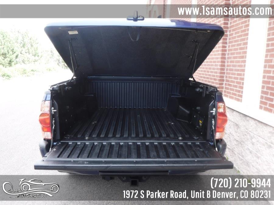 2005 Toyota Tacoma Double 128" Auto 4WD, available for sale in Denver, Colorado | Sam's Automotive. Denver, Colorado 2005 Toyota Tacoma Double 128" Auto 4WD, available for sale in Denver, Colorado | Sam's Automotive. Denver, Colorado