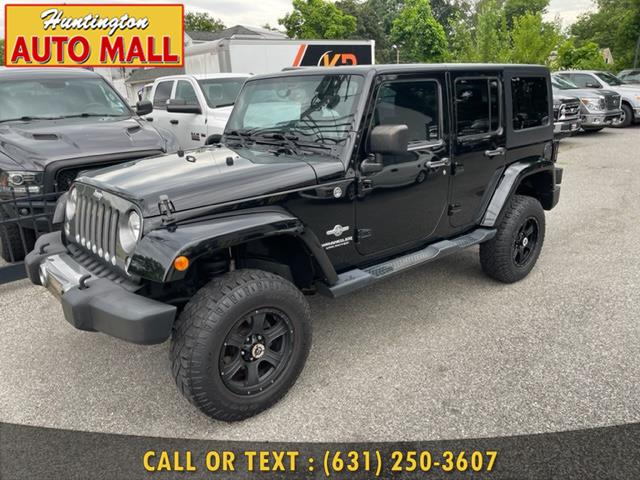 2014 Jeep Wrangler Unlimited 4WD 4dr Willys Wheeler, available for sale in Huntington Station, New York | Huntington Auto Mall. Huntington Station, New York