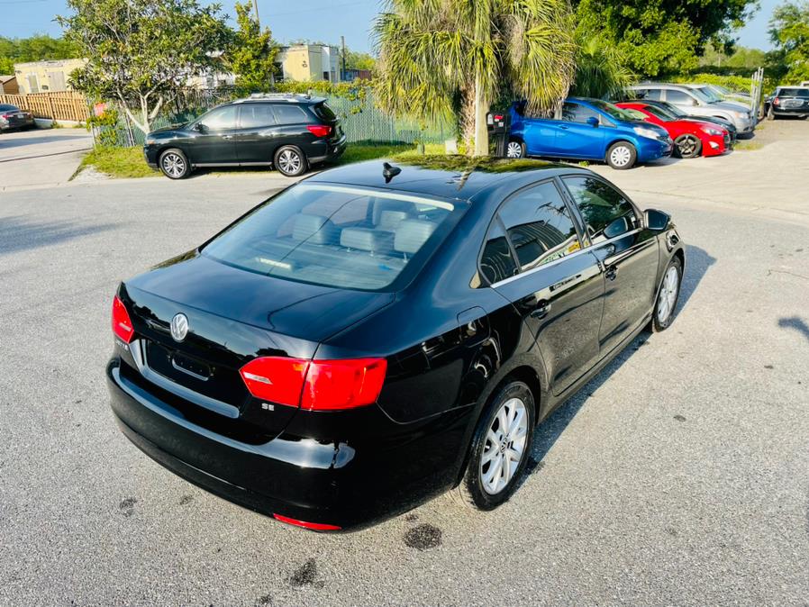 Used Volkswagen Jetta Sedan 4dr Auto SE w/Convenience/Sunroof *Ltd Avail* 2013 | Ideal Auto Sales. Orlando, Florida Used Volkswagen Jetta Sedan 4dr Auto SE w/Convenience/Sunroof *Ltd Avail* 2013 | Ideal Auto Sales. Orlando, Florida