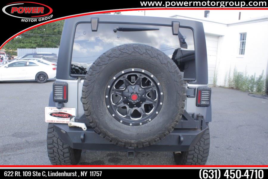 2014 Jeep Wrangler Unlimited 4WD 4dr Sport, available for sale in Lindenhurst, New York | Power Motor Group. Lindenhurst, New York 2014 Jeep Wrangler Unlimited 4WD 4dr Sport, available for sale in Lindenhurst, New York | Power Motor Group. Lindenhurst, New York