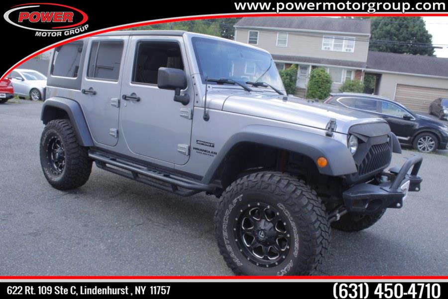 2014 Jeep Wrangler Unlimited 4WD 4dr Sport, available for sale in Lindenhurst, New York | Power Motor Group. Lindenhurst, New York 2014 Jeep Wrangler Unlimited 4WD 4dr Sport, available for sale in Lindenhurst, New York | Power Motor Group. Lindenhurst, New York
