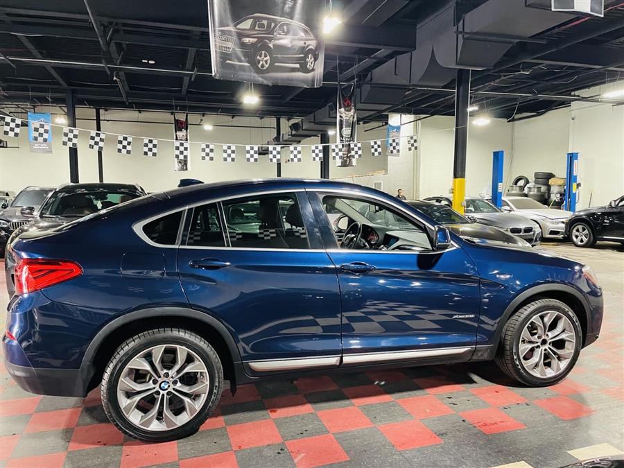 Used BMW X4 xDrive28i Sports Activity Coupe 2017 | Northshore Motors. Syosset , New York Used BMW X4 xDrive28i Sports Activity Coupe 2017 | Northshore Motors. Syosset , New York
