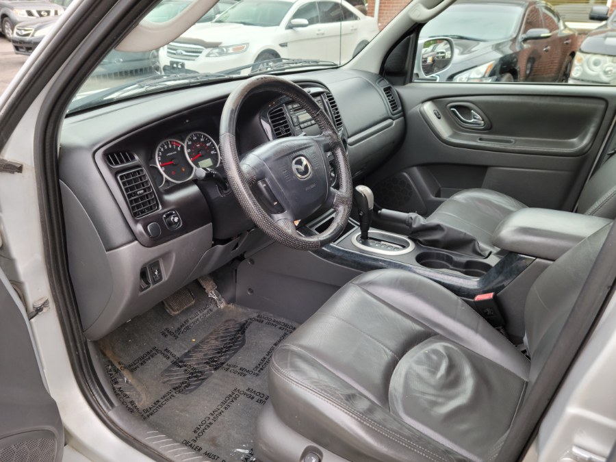 2005 Mazda Tribute 3.0L Auto s 4WD Leather & Sunroof, available for sale in East Windsor, Connecticut | Toro Auto. East Windsor, Connecticut 2005 Mazda Tribute 3.0L Auto s 4WD Leather & Sunroof, available for sale in East Windsor, Connecticut | Toro Auto. East Windsor, Connecticut