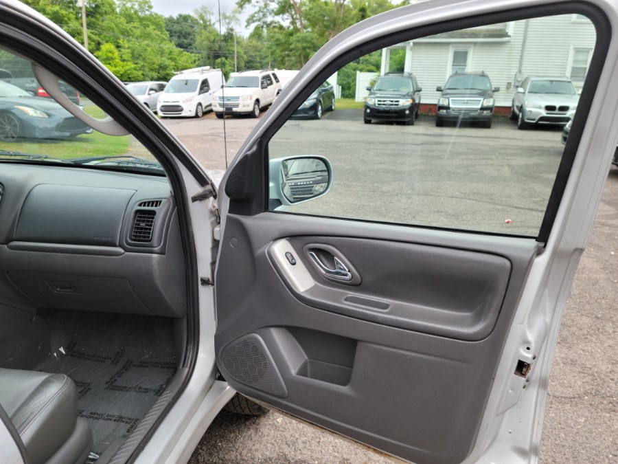2005 Mazda Tribute 3.0L Auto s 4WD Leather & Sunroof, available for sale in East Windsor, Connecticut | Toro Auto. East Windsor, Connecticut 2005 Mazda Tribute 3.0L Auto s 4WD Leather & Sunroof, available for sale in East Windsor, Connecticut | Toro Auto. East Windsor, Connecticut