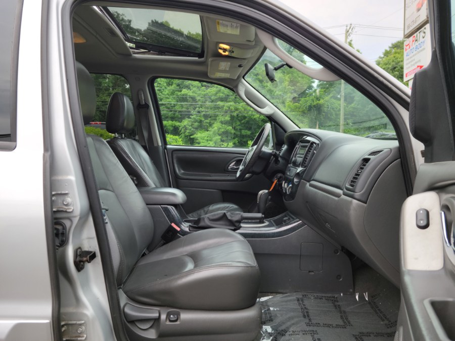 2005 Mazda Tribute 3.0L Auto s 4WD Leather & Sunroof, available for sale in East Windsor, Connecticut | Toro Auto. East Windsor, Connecticut 2005 Mazda Tribute 3.0L Auto s 4WD Leather & Sunroof, available for sale in East Windsor, Connecticut | Toro Auto. East Windsor, Connecticut