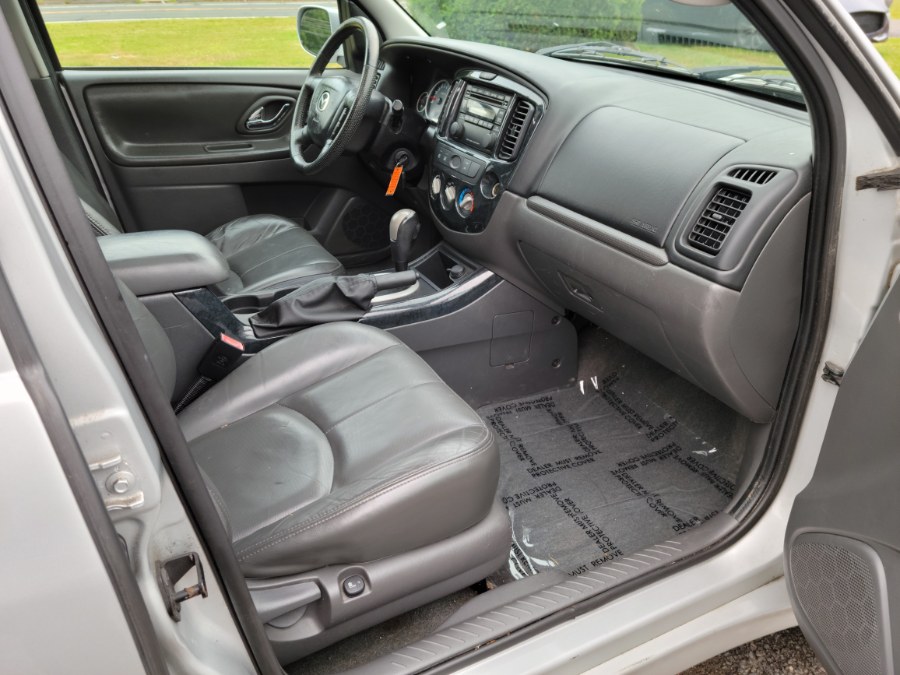 2005 Mazda Tribute 3.0L Auto s 4WD Leather & Sunroof, available for sale in East Windsor, Connecticut | Toro Auto. East Windsor, Connecticut 2005 Mazda Tribute 3.0L Auto s 4WD Leather & Sunroof, available for sale in East Windsor, Connecticut | Toro Auto. East Windsor, Connecticut