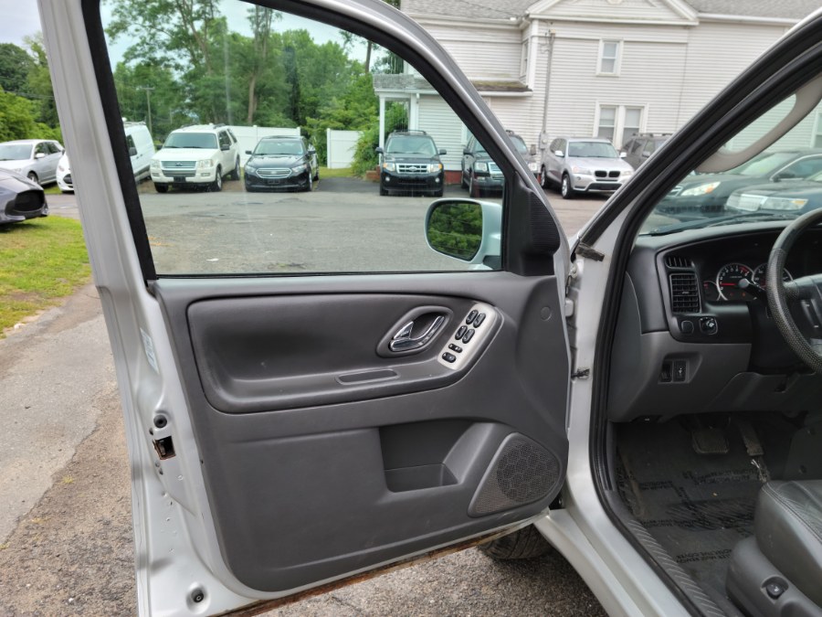 2005 Mazda Tribute 3.0L Auto s 4WD Leather & Sunroof, available for sale in East Windsor, Connecticut | Toro Auto. East Windsor, Connecticut 2005 Mazda Tribute 3.0L Auto s 4WD Leather & Sunroof, available for sale in East Windsor, Connecticut | Toro Auto. East Windsor, Connecticut