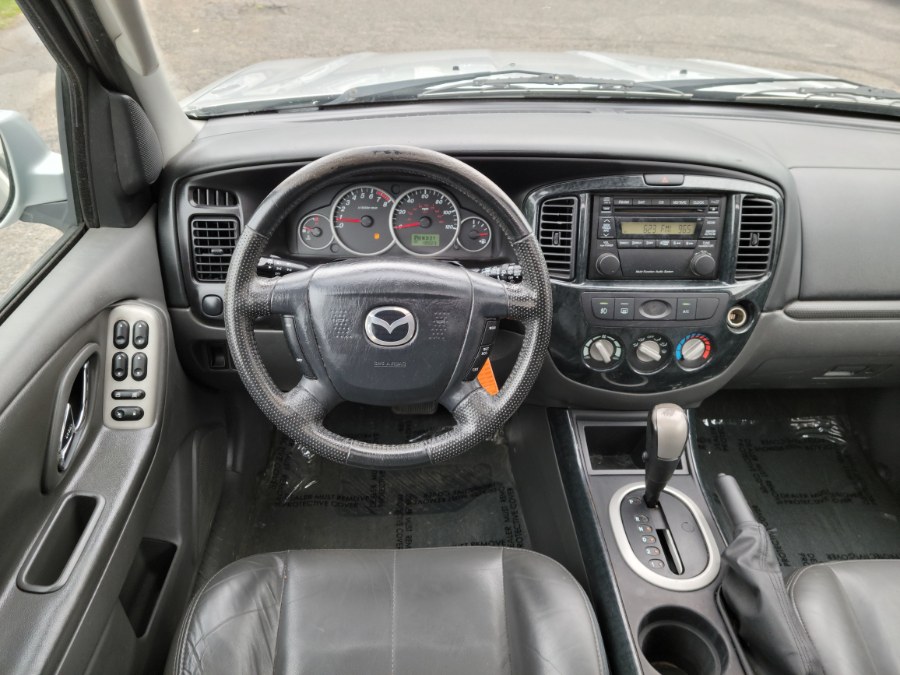 2005 Mazda Tribute 3.0L Auto s 4WD Leather & Sunroof, available for sale in East Windsor, Connecticut | Toro Auto. East Windsor, Connecticut 2005 Mazda Tribute 3.0L Auto s 4WD Leather & Sunroof, available for sale in East Windsor, Connecticut | Toro Auto. East Windsor, Connecticut