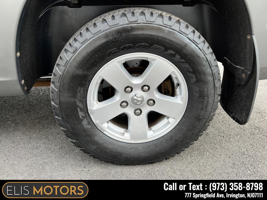 2011 Ram 1500 4WD Quad Cab 140.5" SLT, available for sale in Irvington, New Jersey | Elis Motors Corp. Irvington, New Jersey 2011 Ram 1500 4WD Quad Cab 140.5" SLT, available for sale in Irvington, New Jersey | Elis Motors Corp. Irvington, New Jersey