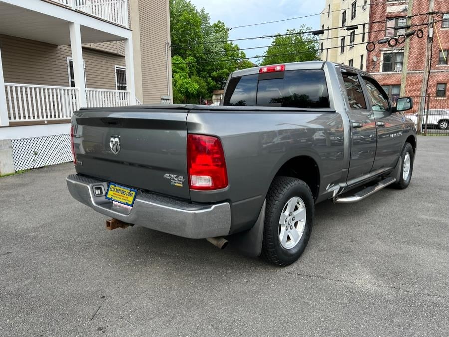 2011 Ram 1500 4WD Quad Cab 140.5" SLT, available for sale in Irvington, New Jersey | Elis Motors Corp. Irvington, New Jersey 2011 Ram 1500 4WD Quad Cab 140.5" SLT, available for sale in Irvington, New Jersey | Elis Motors Corp. Irvington, New Jersey
