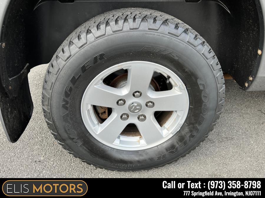 2011 Ram 1500 4WD Quad Cab 140.5" SLT, available for sale in Irvington, New Jersey | Elis Motors Corp. Irvington, New Jersey 2011 Ram 1500 4WD Quad Cab 140.5" SLT, available for sale in Irvington, New Jersey | Elis Motors Corp. Irvington, New Jersey