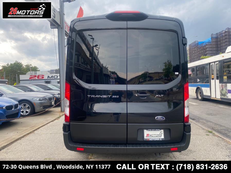 Used Ford Transit Passenger Wagon T-350 148" Med Roof XL RWD 2021 | 26 Motors Queens. Woodside, New York Used Ford Transit Passenger Wagon T-350 148" Med Roof XL RWD 2021 | 26 Motors Queens. Woodside, New York