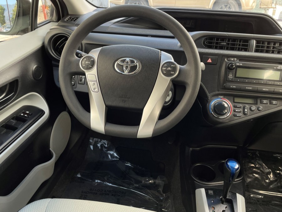 2013 Toyota Prius c 5dr HB Three (Natl), available for sale in Corona, California | Green Light Auto. Corona, California 2013 Toyota Prius c 5dr HB Three (Natl), available for sale in Corona, California | Green Light Auto. Corona, California
