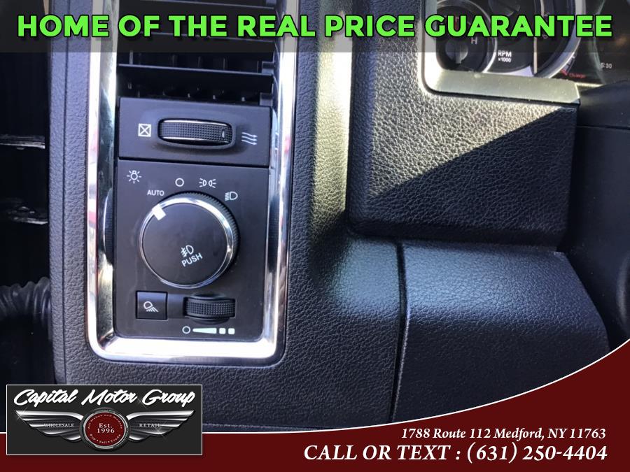 Used Ram 1500 4WD Crew Cab 140.5" Laramie 2014 | Capital Motor Group Inc. Medford, New York Used Ram 1500 4WD Crew Cab 140.5" Laramie 2014 | Capital Motor Group Inc. Medford, New York