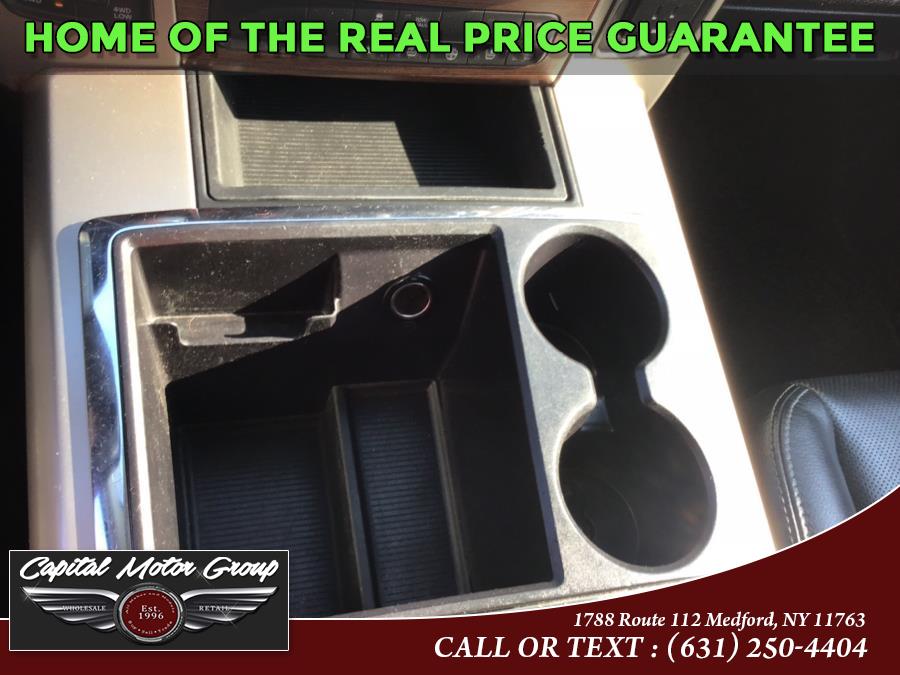 Used Ram 1500 4WD Crew Cab 140.5" Laramie 2014 | Capital Motor Group Inc. Medford, New York Used Ram 1500 4WD Crew Cab 140.5" Laramie 2014 | Capital Motor Group Inc. Medford, New York